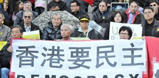 是谁逼得港人触碰“一国两制”的底线?
