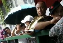 天气酷热,国家信访局接待中心的访民每天都是有增无减(视频)