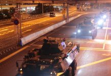 阳光卫视:大批共军军车凌晨抵达香港,港警护送!习近平意欲何为?