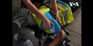 929大游行现场警民对峙 一印尼女记者疑右眼中弹