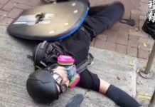 警察實彈擊中男學生左胸 香港各界譴責