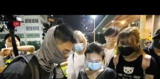 一位蒙面大陸人被港民當場驗證 並接受採訪 一位西人高呼:我愛自由香港