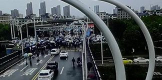 美国之音:江西警察禁湖北人入境 九江桥省界爆群体冲突